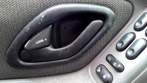 2001-2006 Mazda Tribute Black Interior Door Handle - Left (Driver) (Used OEM)