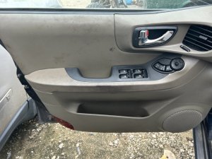 2001-2004 Hyundai Santa Fe Tan Door Interior Trim Panel - Front, Left (Driver) (Used OEM)