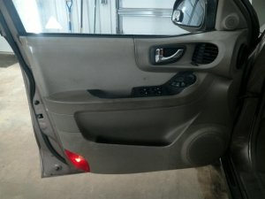 2001-2006 Hyundai Santa Fe Tan Door Interior Trim Panel with Power Windows and Locks - Front, Left (Driver) (Used OEM)