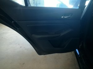 2019-2025 Nissan Altima Black Door Interior Trim Panel with Power Windows and Locks - Rear, Left (Driver) (Used OEM)