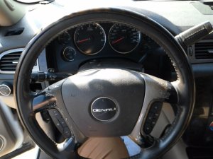 2009-2010 GMC Sierra Tan Tilt Steering Column with Cruise and Radio Controls (Used OEM)