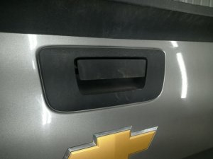  Chevrolet Silverado 3500 Black Tailgate Exterior Door Handle Bezel (Used OEM)