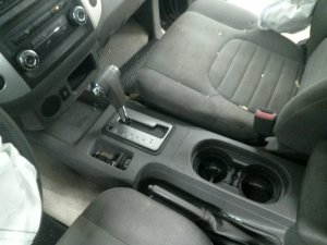 2015-2019 Nissan Frontier Black Floor Console Panel (Used OEM)