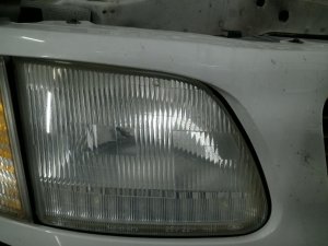 1997-1999 Ford F-250 Capsule Headlight Assembly with Adjuster - Right (Passenger) (Used OEM)