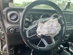 2018-2025 Jeep Wrangler Black Tilt Steering Column with Cruise and Radio Controls (Used OEM)
