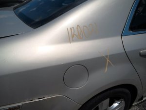 2005-2010 Pontiac G6 Gold Sedan Fuel Filler Door (Used OEM)