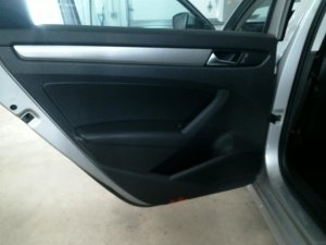 2012-2015 Volkswagen Passat Tan Door Interior Trim Panel with Power Windows and Locks - Rear, Left (Driver) (Used OEM)