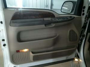 2000-2005 Ford Excursion Tan Door Interior Trim Panel with Power Windows and Locks - Front, Left (Driver) (Used OEM)