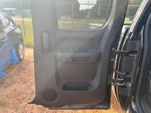 2007-2014 GMC Sierra 2500 HD Black Door Interior Trim Panel - Rear, Left (Driver) (Used OEM)