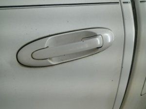 2001-2007 Toyota Sequoia White Rear Exterior Door Handle - Left (Driver) (Used OEM)