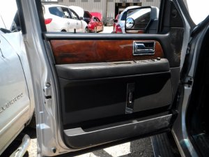 2007-2014 Lincoln Navigator Black Door Interior Trim Panel with Power Windows and Locks - Front, Left (Driver) (Used OEM)