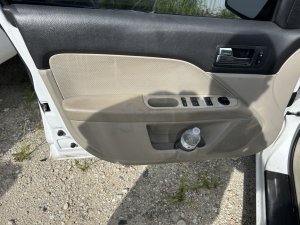 2006-2009 Ford Fusion Tan Door Interior Trim Panel - Front, Left (Driver) (Used OEM)