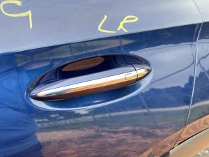 2017-2024 GMC Acadia Black Exterior Door Handle with Chrome Strip - Rear, Left (Driver) (Used OEM)