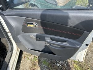 2006-2011 Kia Rio Black Door Interior Trim Panel - Front, Right (Passenger) (Used OEM)