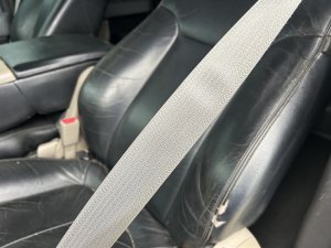 2009-2014 Ford F-150 Black Seat Belt Assembly with Retractor and Pretensioner - Front, Left (Driver) (Used OEM)