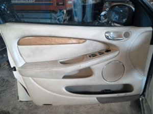 2002-2008 Jaguar X-Type Tan Door Interior Trim Panel with Power Windows and Locks - Front, Left (Driver) (Used OEM)