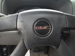 2005-2009 GMC Envoy Black Steering Wheel Air Bag - Left (Driver) (Used OEM)