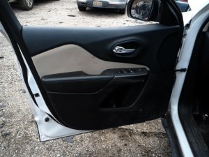 2014-2018 Jeep Cherokee Tan Door Interior Trim Panel with Power Windows and Locks - Front, Left (Driver) (Used OEM)