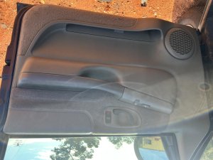 1998-2005 GMC Jimmy Gray Door Interior Trim Panel - Front, Right (Passenger) (Used OEM)