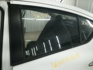 2012-2019 Nissan Versa Sedan Rear Window Glass - Left (Driver) (Used OEM)