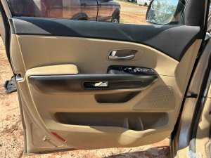 2015-2021 Kia Sedona Tan Door Interior Trim Panel - Front, Left (Driver) (Used OEM)