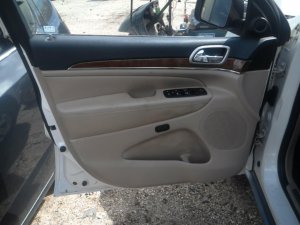 2011-2021 Jeep Grand Cherokee Tan Door Interior Trim Panel with Power Windows and Locks - Front, Left (Driver) (Used OEM)