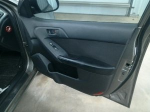 2010-2013 Kia Forte Black Door Interior Trim Panel - Front, Right (Passenger) (Used OEM)