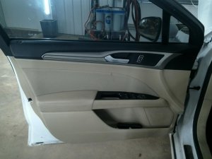 2013-2016 Ford Fusion Tan Door Interior Trim Panel with Power Windows and Locks - Front, Left (Driver) (Used OEM)