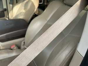 2011-2012 Ram 1500 Black Seat Belt Assembly with Pretensioner - Front, Left (Driver) (Used OEM)