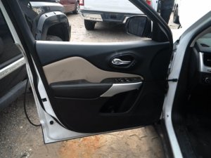 2014-2018 Jeep Cherokee Tan Door Interior Trim Panel with Power Windows and Locks - Front, Left (Driver) (Used OEM)