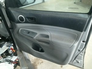 2012-2015 Toyota Tacoma Gray Door Interior Trim Panel - Front, Right (Passenger) (Used OEM)