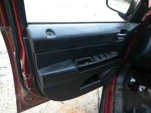 2007-2017 Jeep Compass Black Door Interior Trim Panel with Power Windows and Locks - Front, Left (Driver) (Used OEM)