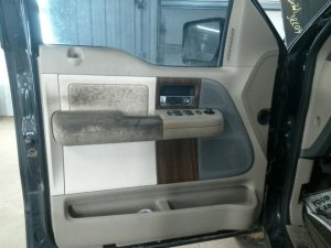 2004-2008 Ford F-150 Tan Door Interior Trim Panel with Manual Windows and Manual Locks - Front, Left (Driver) (Used OEM)