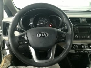 2012-2015 Kia Rio Tan Tilt Steering Column with Cruise and Radio Controls (Used OEM)