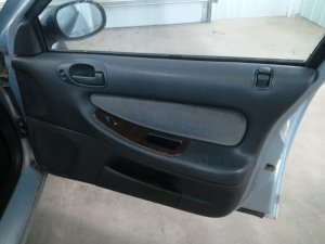 2001-2006 Dodge Stratus Black Door Interior Trim Panel with Power Windows and Locks - Front, Right (Passenger) (Used OEM)