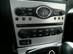 2007-2008 INFINITI G35 Automatic Temperature and Radio Control Panel Assembly (Used OEM)