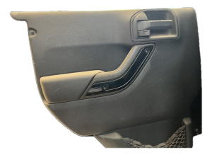 2011-2018 Jeep Wrangler Black Door Interior Trim Panel - Rear, Left (Driver) (Used OEM)