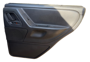 1999-2004 Jeep Grand Cherokee Black Door Interior Trim Panel - Rear, Right (Passenger) (Used OEM)