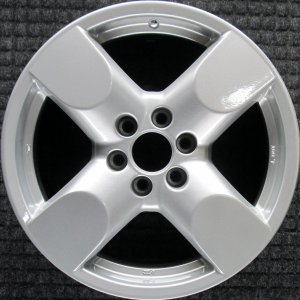2005-2009 Nissan Xterra Silver 17x7.5 4-Spoke Alloy Wheel (Remanufactured OEM)