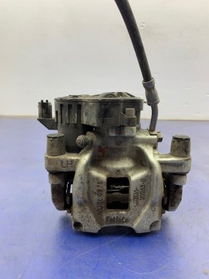 2021-2025 Ford Mustang Mach-E Red Disc Brake Caliper with Electric Parking Brake Actuator - Rear, Left (Driver) (Used OEM)
