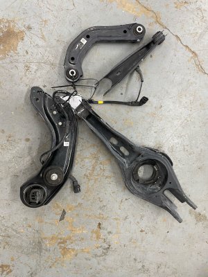 2021-2025 Kia K5 Lower Suspension Control Arm Set - Rear, Left (Driver) (Used OEM)