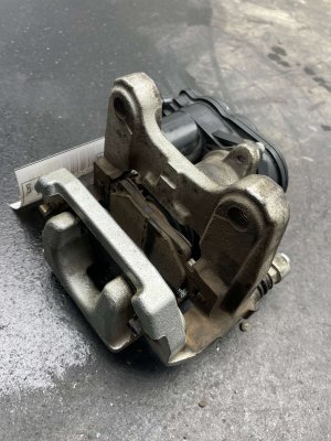 2024-2025 Toyota Grand Highlander Disc Brake Caliper and Bracket with Motor - Rear, Left (Driver) (Used OEM)