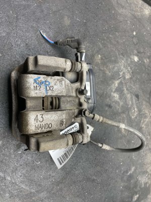 2020-2025 Kia Telluride Disc Brake Caliper with Electric Actuator and Bracket - Rear, Left (Driver) (Used OEM)