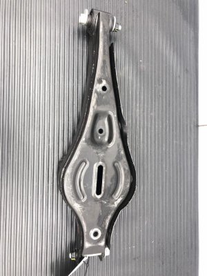 2022-2025 Kia Carnival Lower Suspension Control Arm and Spring Seat - Rear, Left (Driver) (Used OEM)