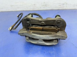 2006-2013 INFINITI QX56 Disc Brake Caliper Assembly - Front, Right (Passenger) (Used OEM)