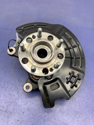 2022-2025 Kia Carnival Steering Knuckle and Wheel Hub Assembly - Front, Left (Driver) (Used OEM)
