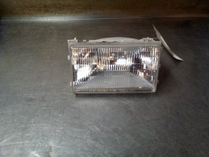 1989-1990 Ford Bronco II Headlight Assembly - Left (Driver) (Used OEM)