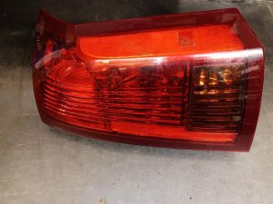 2004-2007 Cadillac CTS Silver Tail Light Assembly - Right (Passenger) (Used OEM)