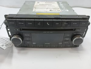 2008-2009 Dodge Grand Caravan AM/FM 6-Disc DVD MP3 Player Radio (Used OEM)