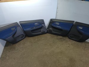 2005-2007 Subaru Impreza Black Front and Rear Door Interior Trim Panel Set (Used OEM)